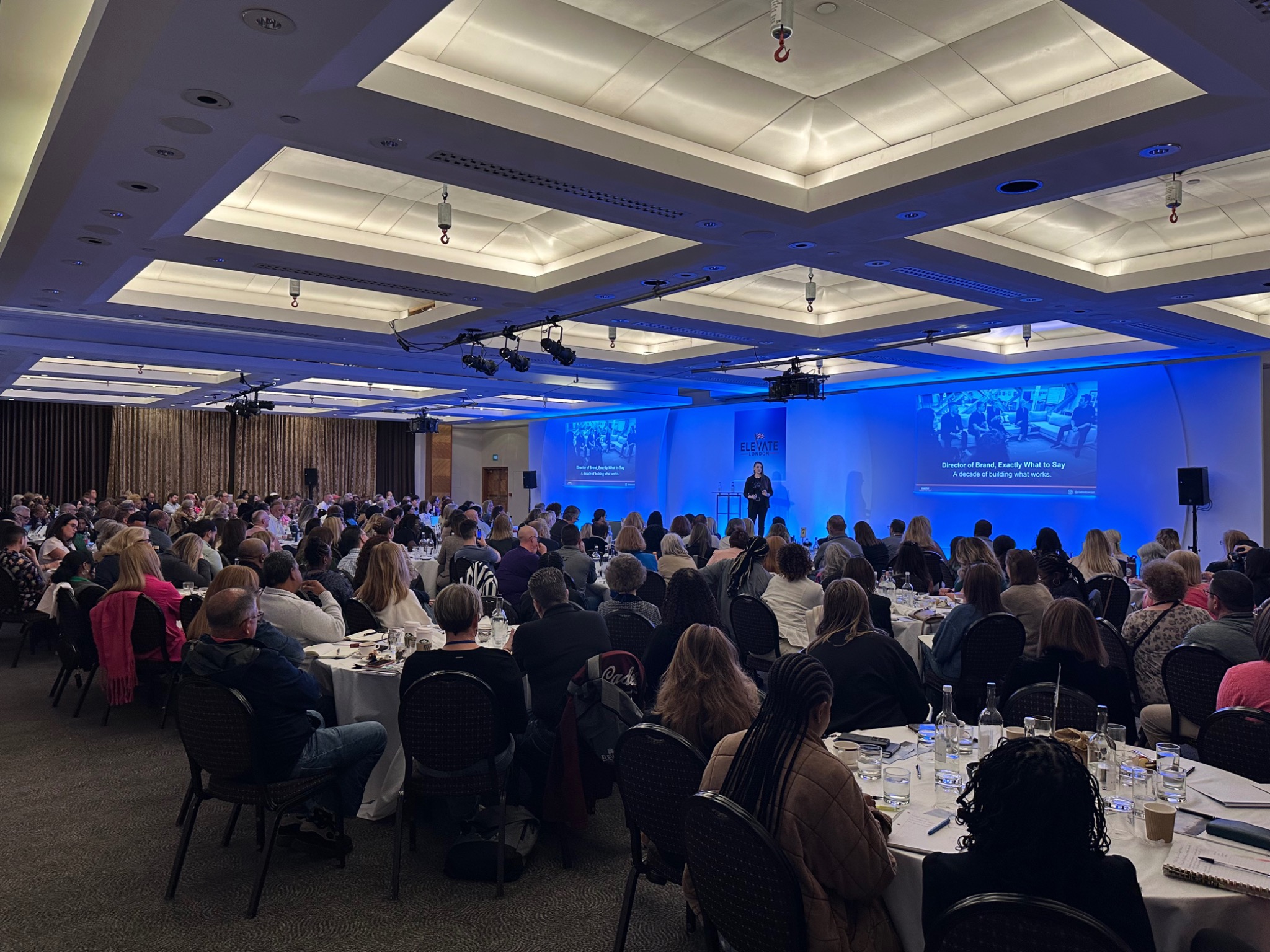 Claire addressing the audience at Elevate London